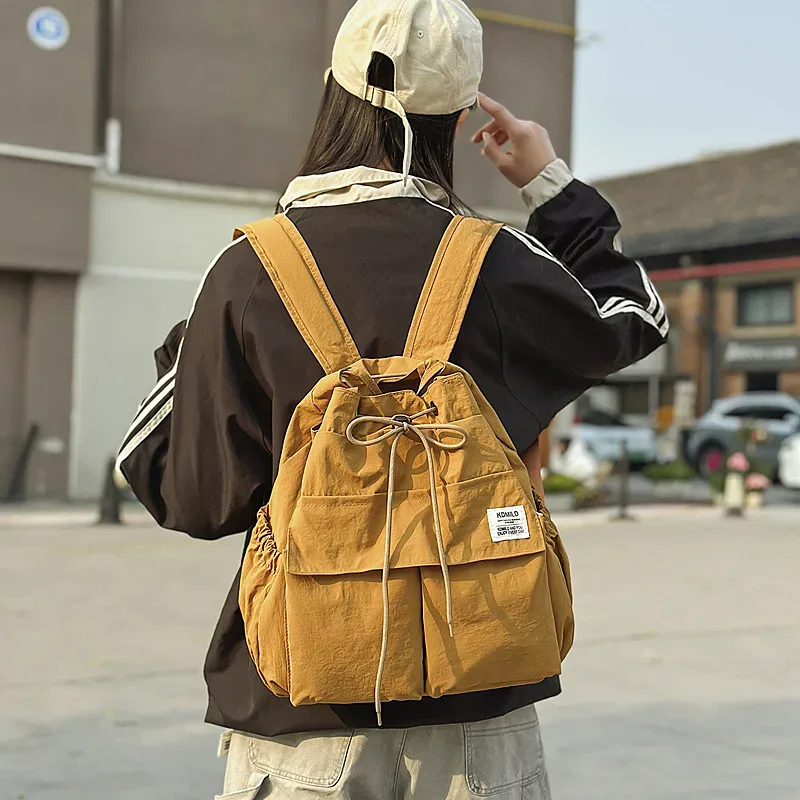sac à dos léger et décontracté pour femme, idéal pour les voyages, les loisirs en plein air, en nylon, capacité 20-35l, avec compartiment pour ordinateur portable 14 pouces