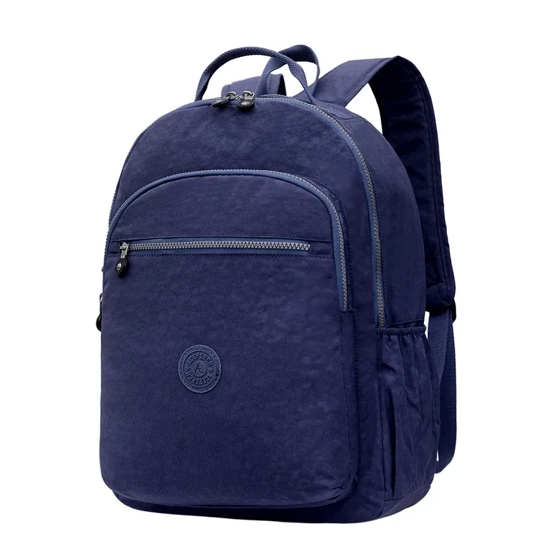 sac dos nylon gris anthracite compartiments poches latérales glissière accessoires pompon porte monnaie voyage école adolescente