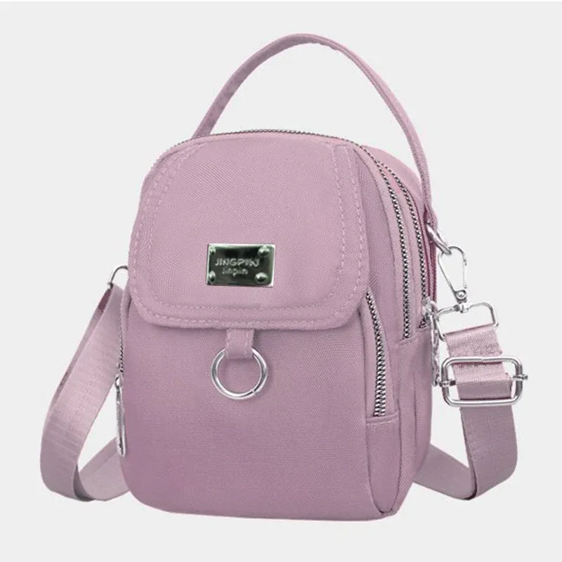 sac à dos convertible compact grace, sac en nylon léger de couleur unie avec large bandoulière amovible