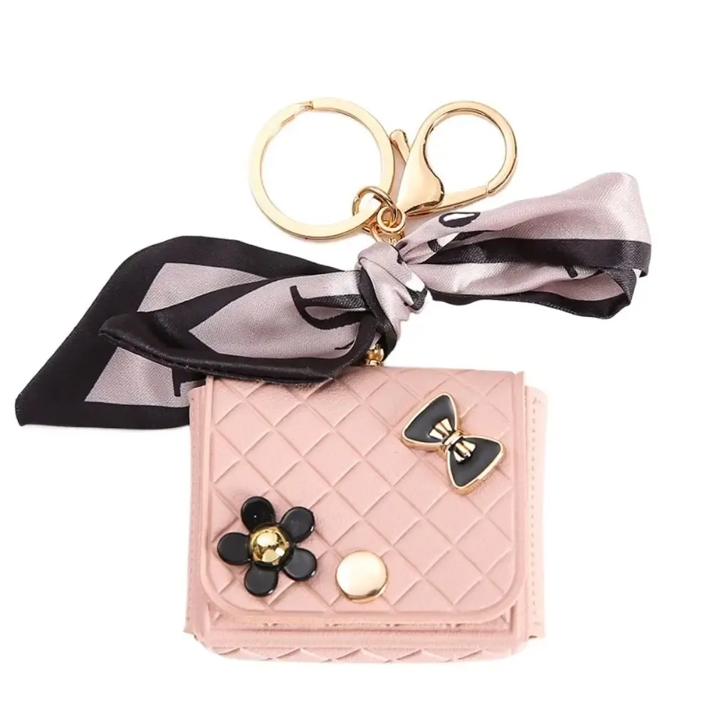 nouvelle pochette de rangement en cuir 2026 pour écouteurs, mini porte-clés créatif, pendentif couleur unie, étui pour écouteurs bluetooth