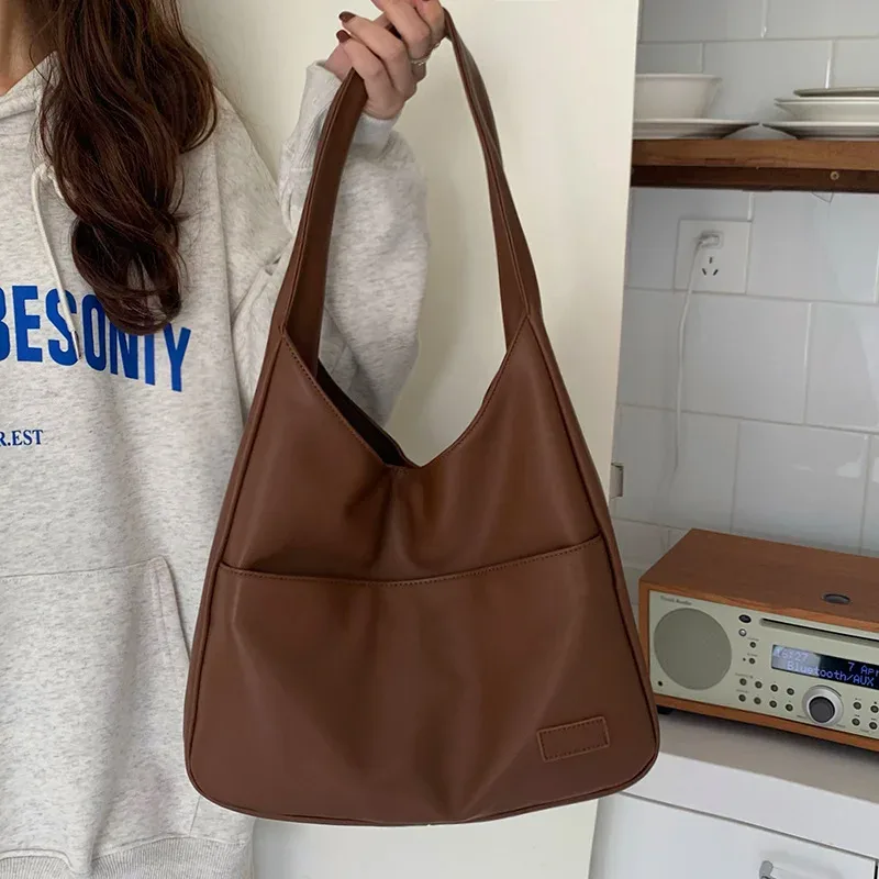 cgcbag 2024 nouveau simple grande capacité femmes sac à bandoulière décontracté déplacements luxe design sacs à main de haute qualité en cuir fourre-tout sac