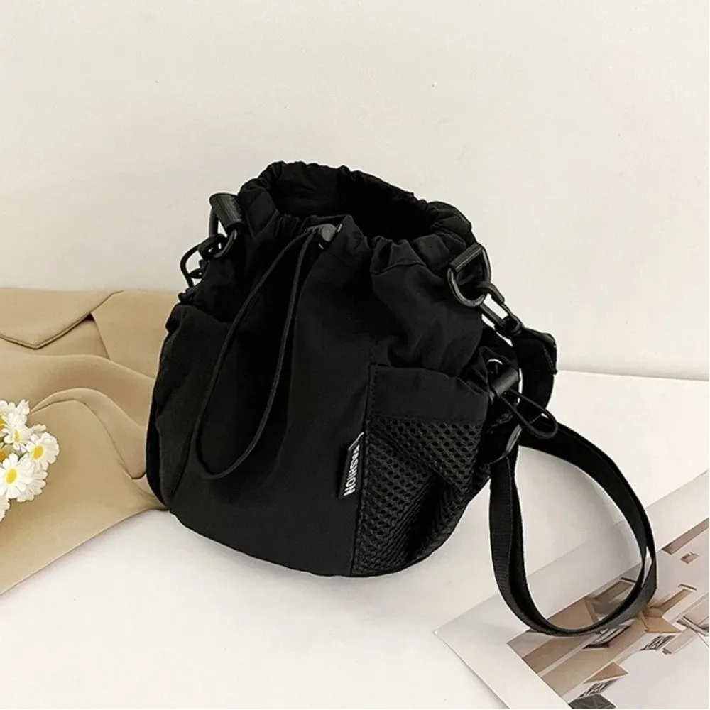 sac à bandoulière simple portable en nylon, petit sac léger de couleur unie pour l'extérieur