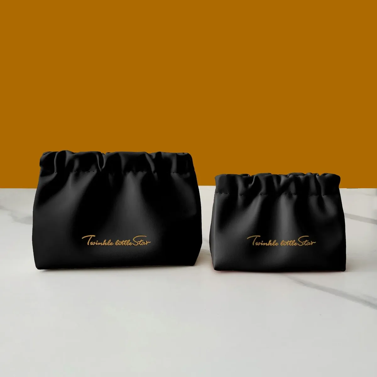 organisateur voyage cosmétiques pliables ovale ouvert motif plissé couleur bleu noir beige femme maquillage chauffereuse