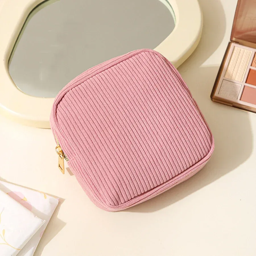 pochette polyester beige rayures verticales cosmétiques serviettes hygiéniques voyage femmes organisateur tranche usage polyvalent