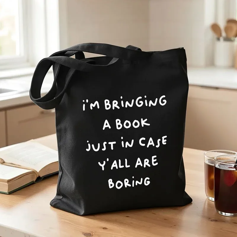 sac fourre-tout en toile imprimé double face 1a, fond noir avec texte blanc, matériau en polyester durable, très adapté pour les livres.