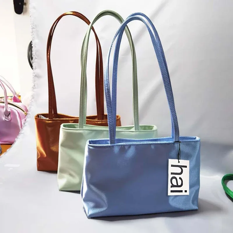 sacs à bandoulière de luxe en soie pour femmes, sac carré sous les bras, sac de banlieue de marque célèbre, fourre-tout macaron de couleur contrastée