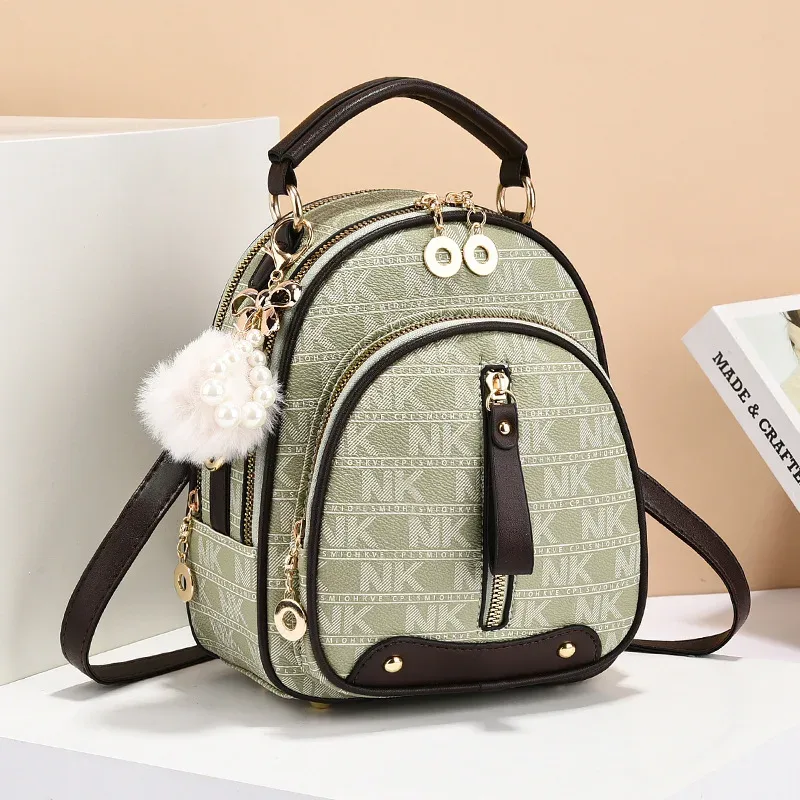 sac dos cuir similicuir vert motif géométrique pomponne métallique bandoulière amovible compartiment intérieur fermeture éclair polyvalent voyage