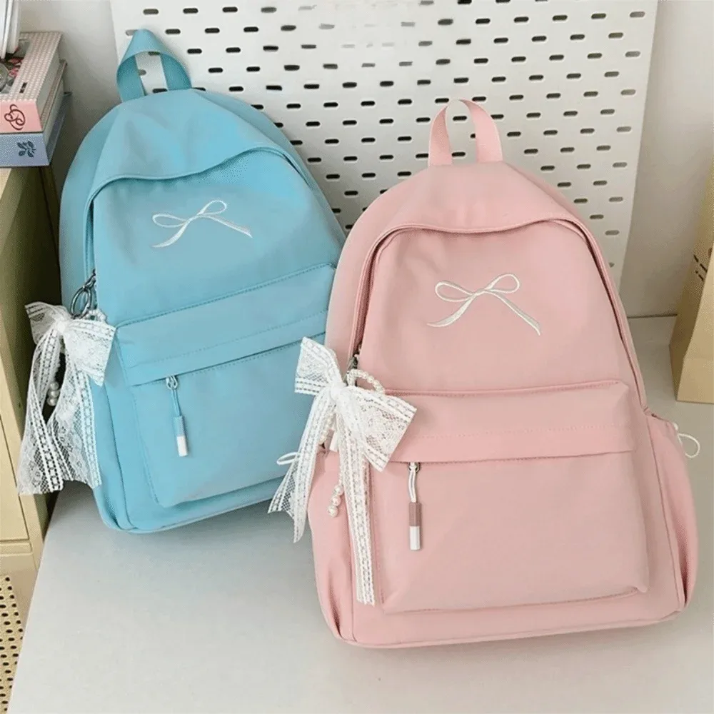 sac à dos portable avec nœud brodé pour filles, cartable en nylon de grande capacité pour étudiants, sac à dos de voyage léger de couleur unie
