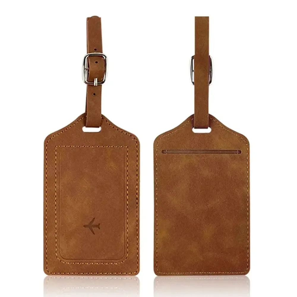 étiquette bagage cuir doré marron rose orange voyage identification nom adresse portable traçabilité bagage