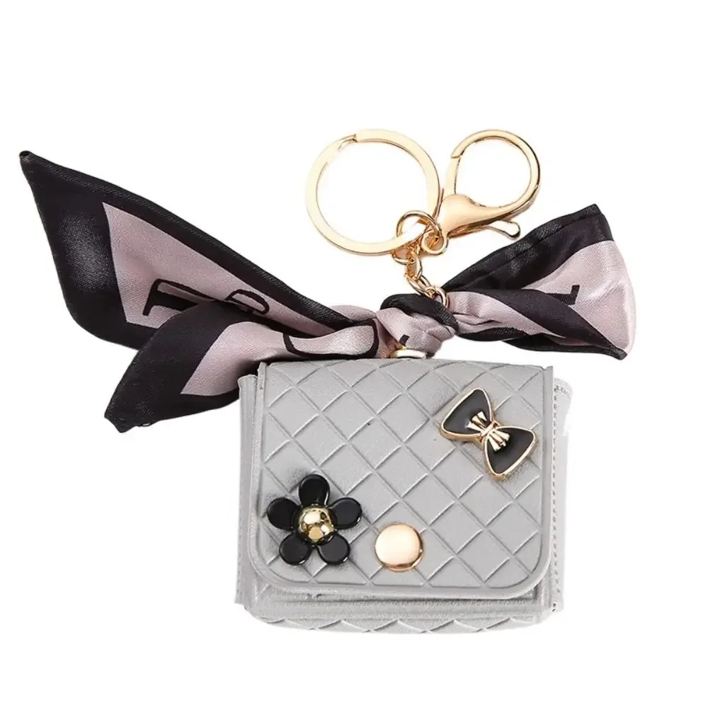 nouvelle pochette de rangement en cuir 2026 pour écouteurs, mini porte-clés créatif, pendentif couleur unie, étui pour écouteurs bluetooth