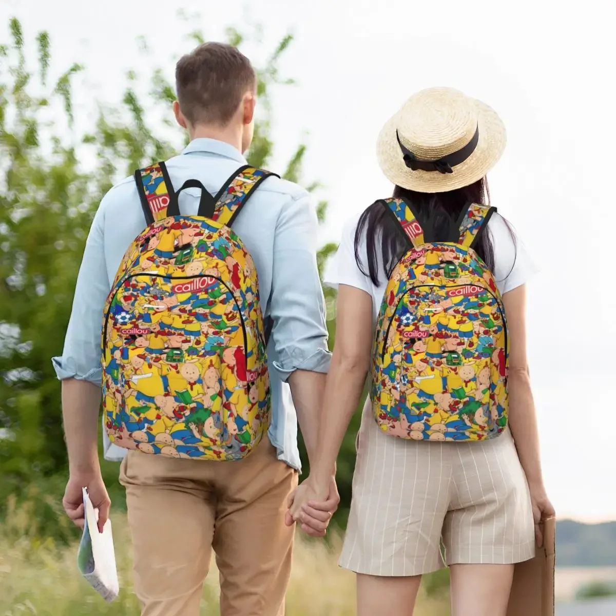 sac dos toile personnages animés jaune rouge bleu beige forme rectangulaire poignée noire travail ecole universite voyage famille