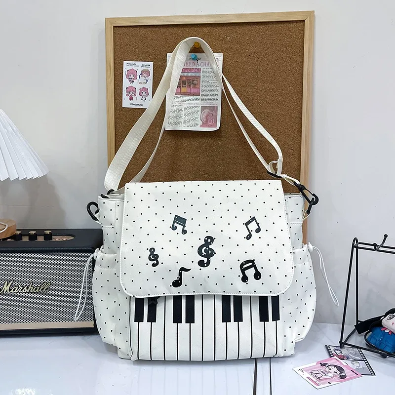 sac à dos ailes d'ange de marque pour filles, niche douce et polyvalente, en toile, nouveau sac de voyage tendance y2k avec pompon, grande capacité
