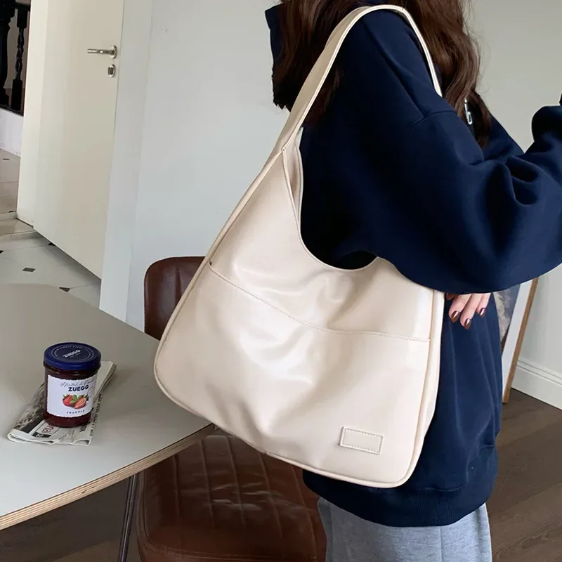 cgcbag 2024 nouveau simple grande capacité femmes sac à bandoulière décontracté déplacements luxe design sacs à main de haute qualité en cuir fourre-tout sac