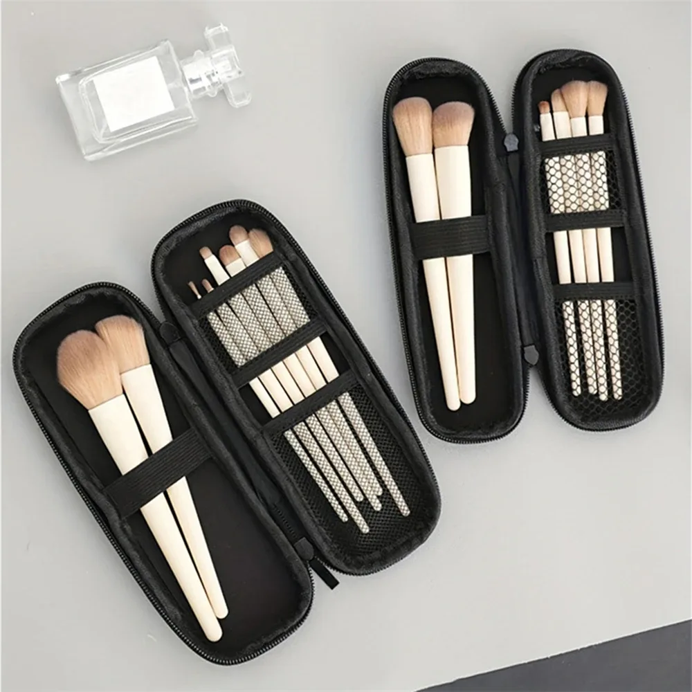 trousse toilette cosmétiques matériau composite impermeable noir blanc compartiments texturés organisation maquillage voyage bureau