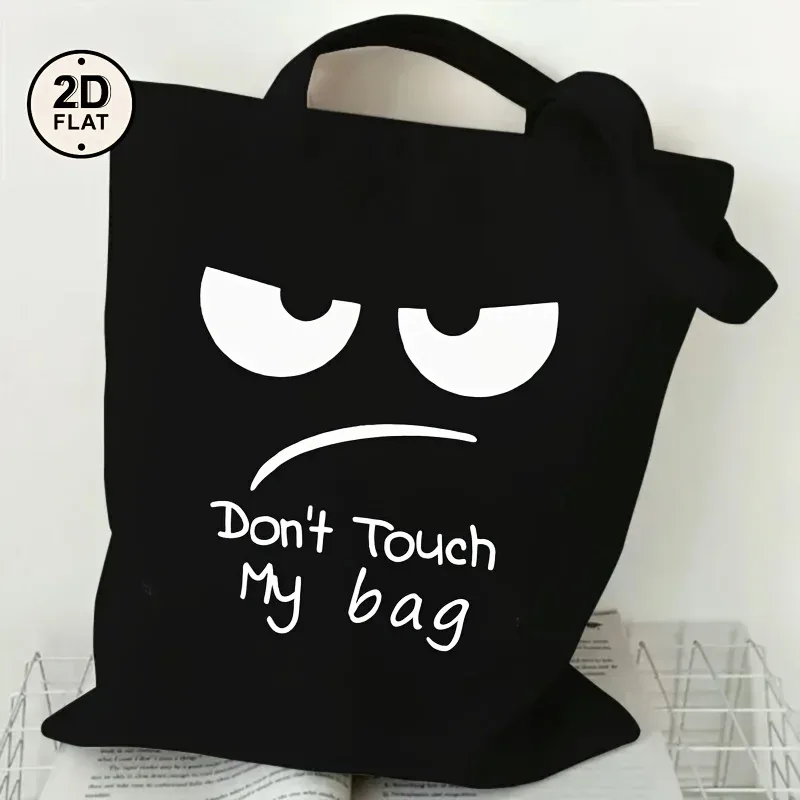 un sac fourre-tout imprimé avec la mention « don'touch my bag », un sac à bandoulière noir décontracté, avec des bretelles fixes, convient pour le shopping.