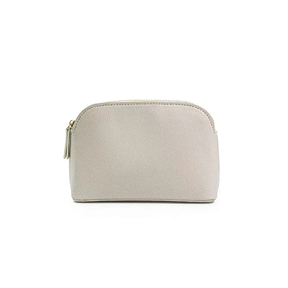 sac compression cuir similicuir texture grainée couleurs rose violet bleu gris noir rouge kaki beige lisa doré voyage cosmétiques