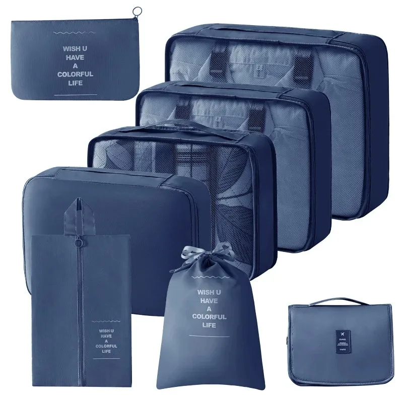 organisateur voyage polyester beige clair cube rangement pliable sac accessoires vêtements chaussures tranches bandes noires fonctionnel