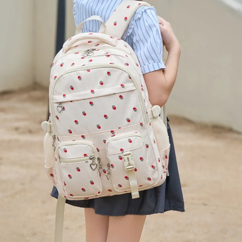 sac dos nylon fraise rouge blanc rose violet beige imperméable bandoulière poche téléphone voyager école
