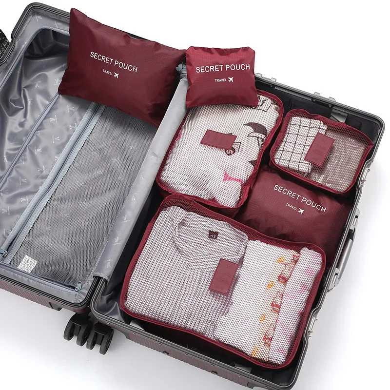 organisateur voyage polyestere rouge bleu blanc vert rose compact minimaliste pliable transport usage quotidien multifonction stockage effets personnels