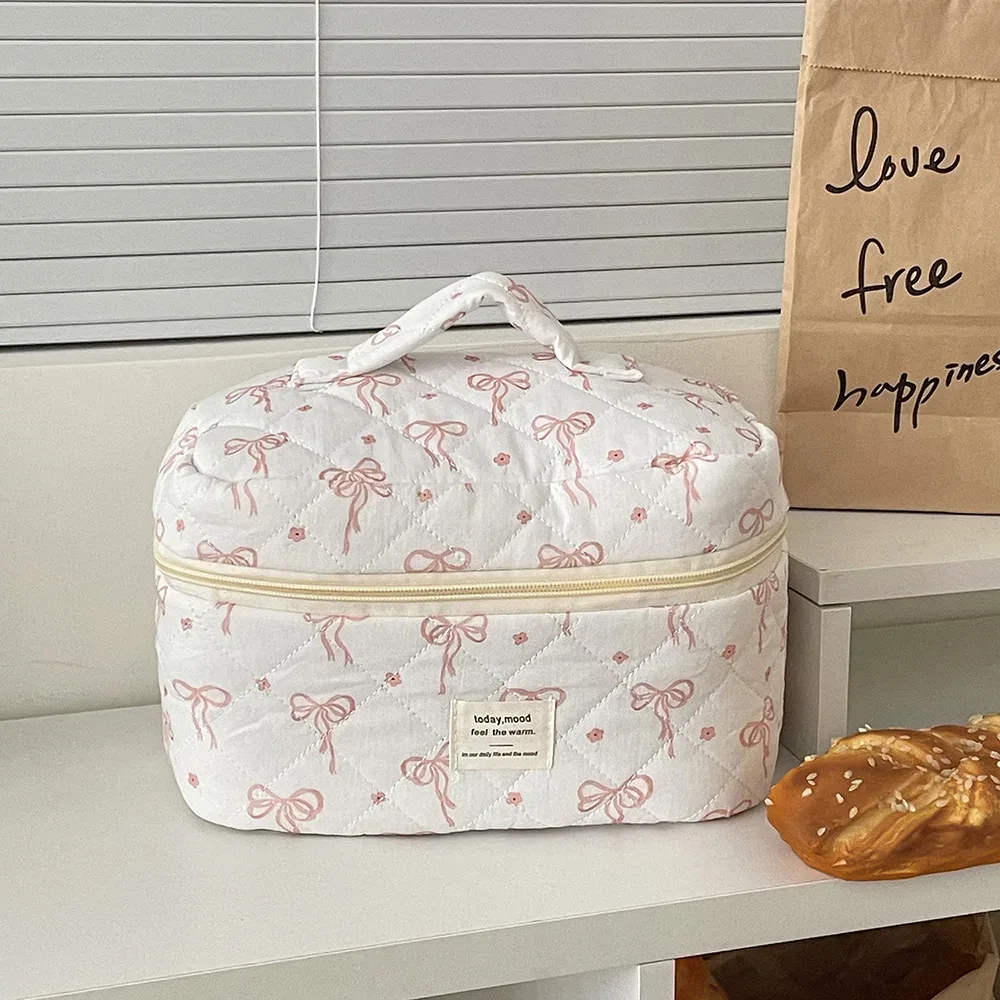 sac de maquillage matelassé avec nœud papillon pour femmes, fourre-tout portable, pochette de rangement de cosmétiques et de toilette, sac à main à fleurs avec fermeture éclair, vente en gros