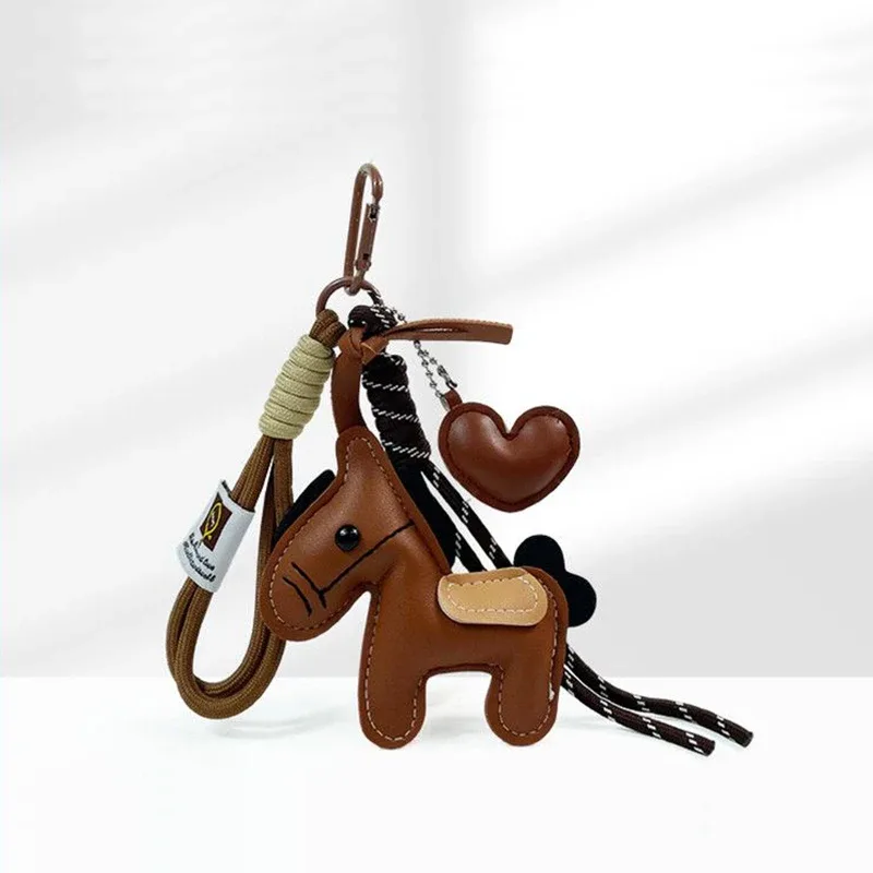 porte-clés en corde tressée avec pendentif en cuir motif cheval, accessoire de mode pour sacs à main, sacs à dos et décoration de clés de voiture