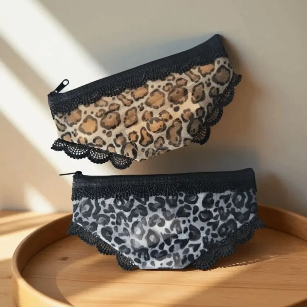 pochette de maquillage chic en forme de culotte à imprimé léopard, avec fermeture éclair, sac cosmétique portable en maille, pochette de rangement transparente ornée de dentelle, idéale pour les voyages.