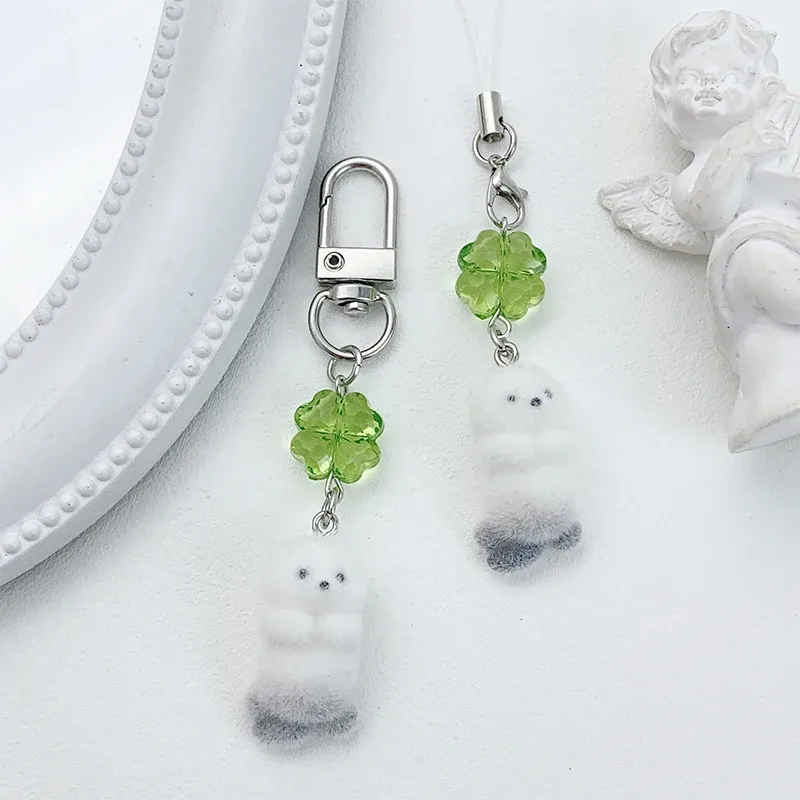 breloque de téléphone anime mignonne en forme de loutre, pendentif caméra trèfle à quatre feuilles kawaii, porte-clés tendance et élégant, décoration pour sac à dos, cadeau