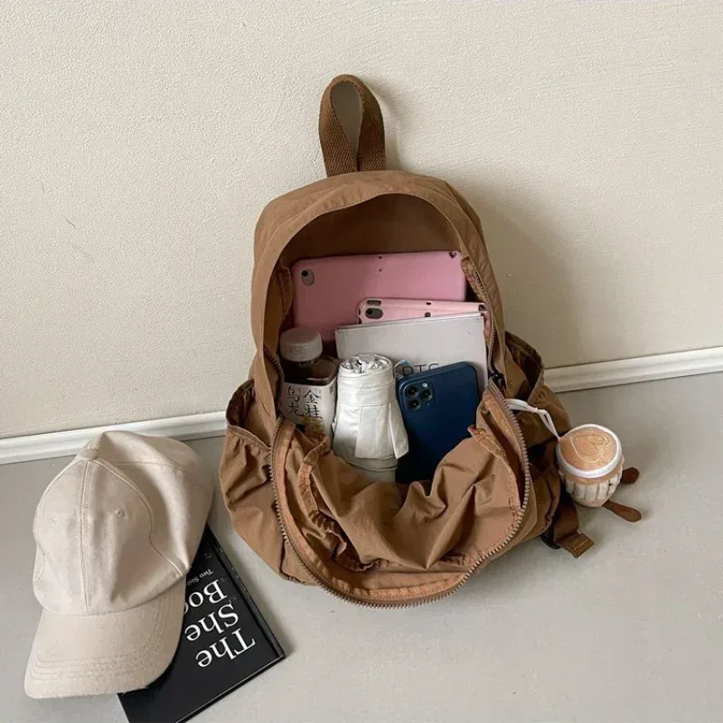 sac dos nylon beige pliant grande capacité voyage étudiant lycée scolaire pli cartable sac dos