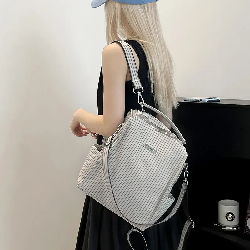 nouveau ins mode niche sac à dos simple épaule portable messager polyvalent multifonctionnel sac à dos