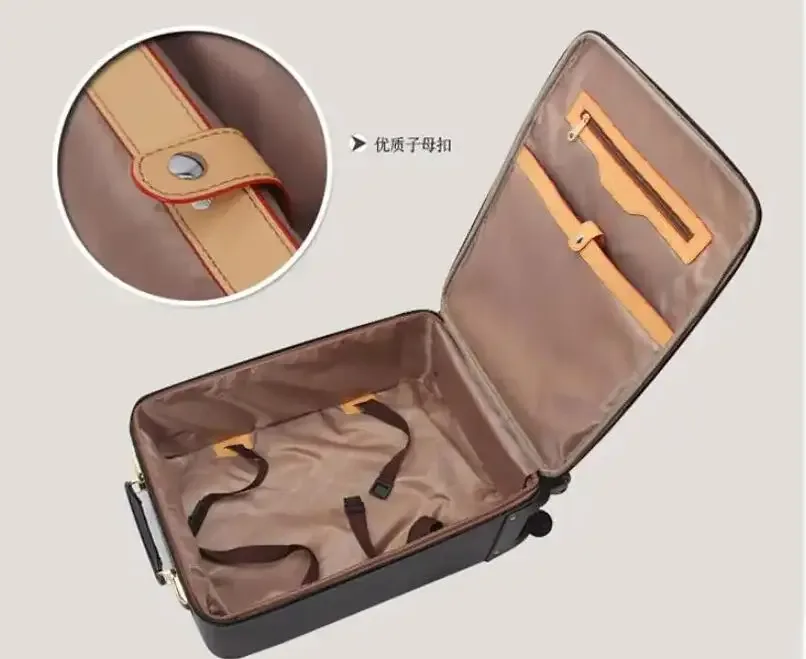 valise carrée cuir marron accents dorés roulettes quatre coins ceinture maintien intérieur marron affaires voyage