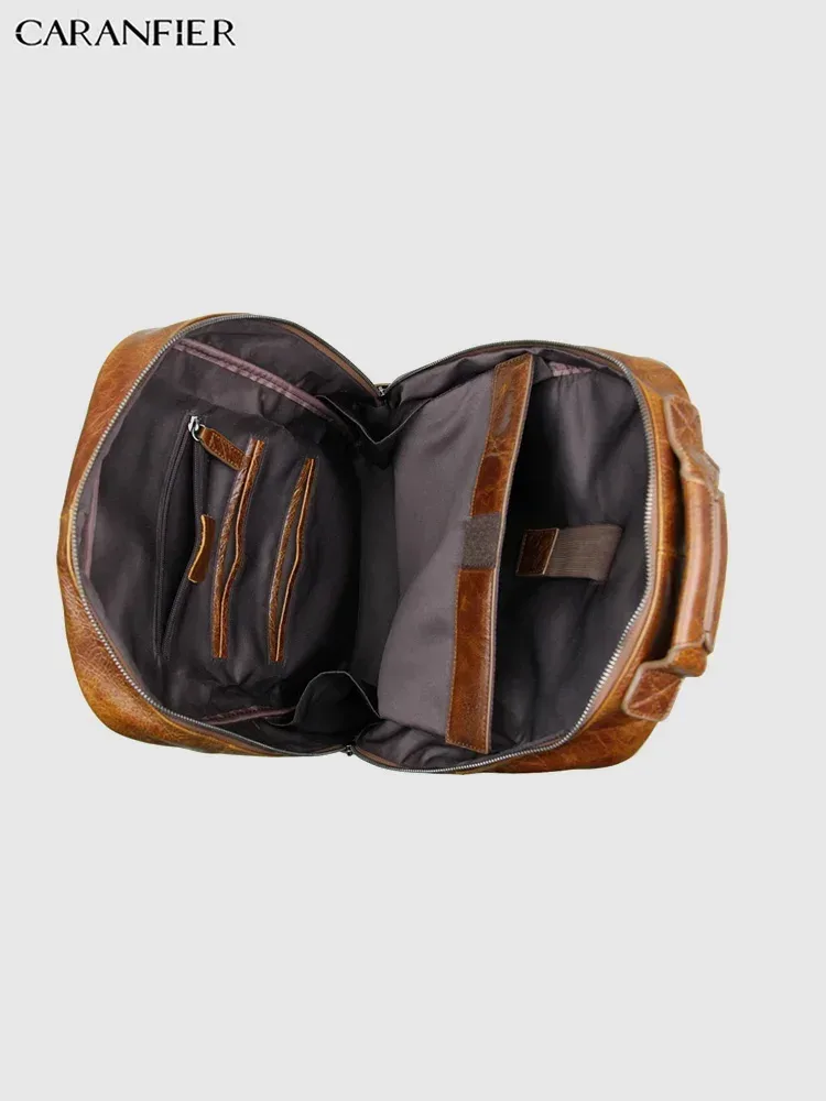 sac dos cuir véritable marron foncé poignées boucles métalliques pochette latérale bandoulière arquée fermeture éclair informatique voyage