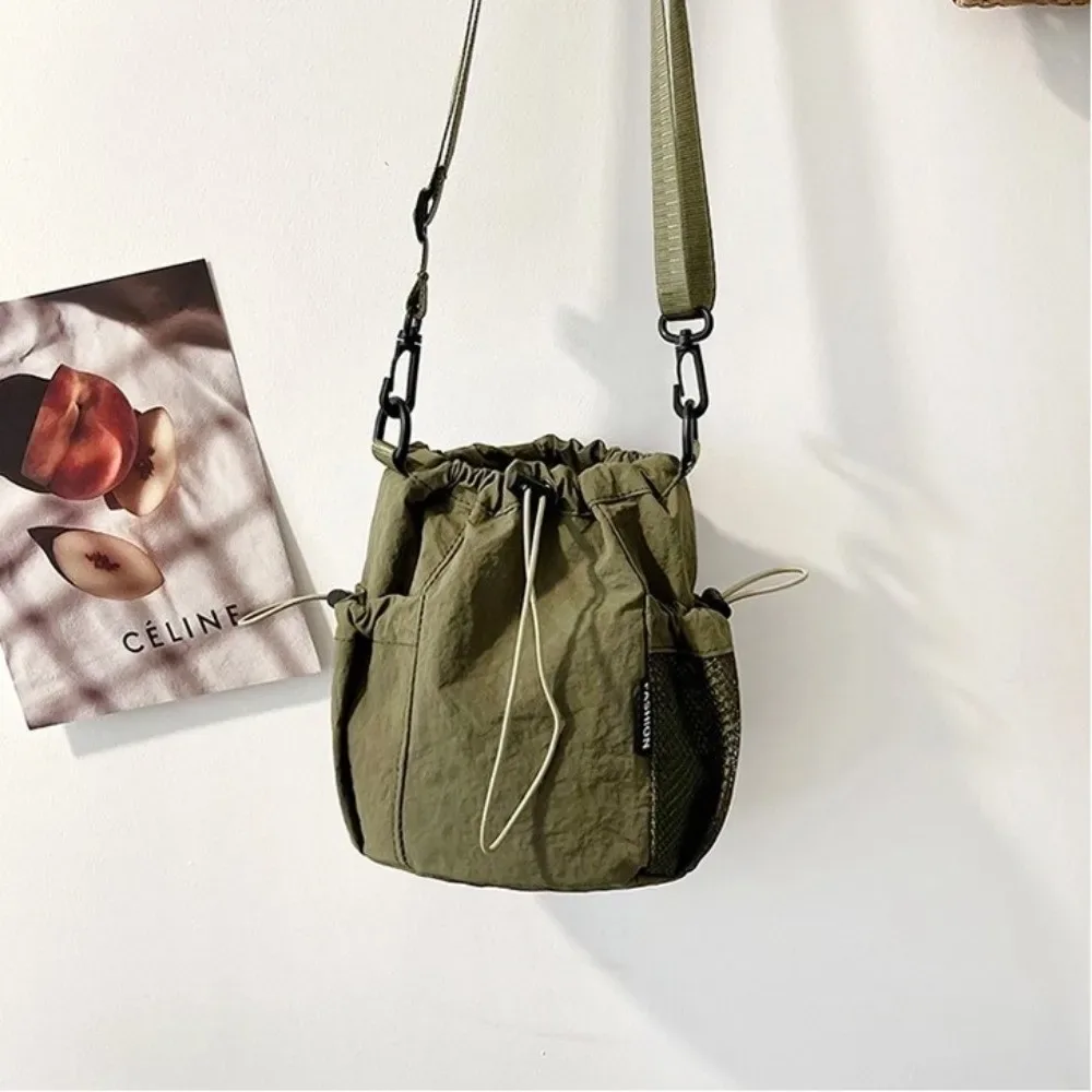 sac à bandoulière simple portable en nylon, petit sac léger de couleur unie pour l'extérieur