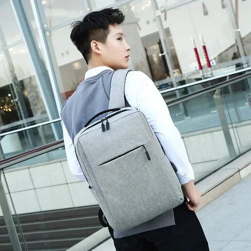 sacs à dos d'affaires pour hommes et femmes, sac à dos de voyage portable de grande capacité, sac pour ordinateur portable ultraléger unisexe, cartable d'étudiant de couleur unie