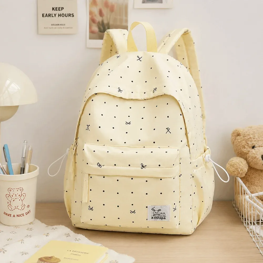 Sac à dos léger et mignon à pois avec nœud, décontracté, pour étudiants, respirant, polyvalent, grande capacité, sac d'école, voyage