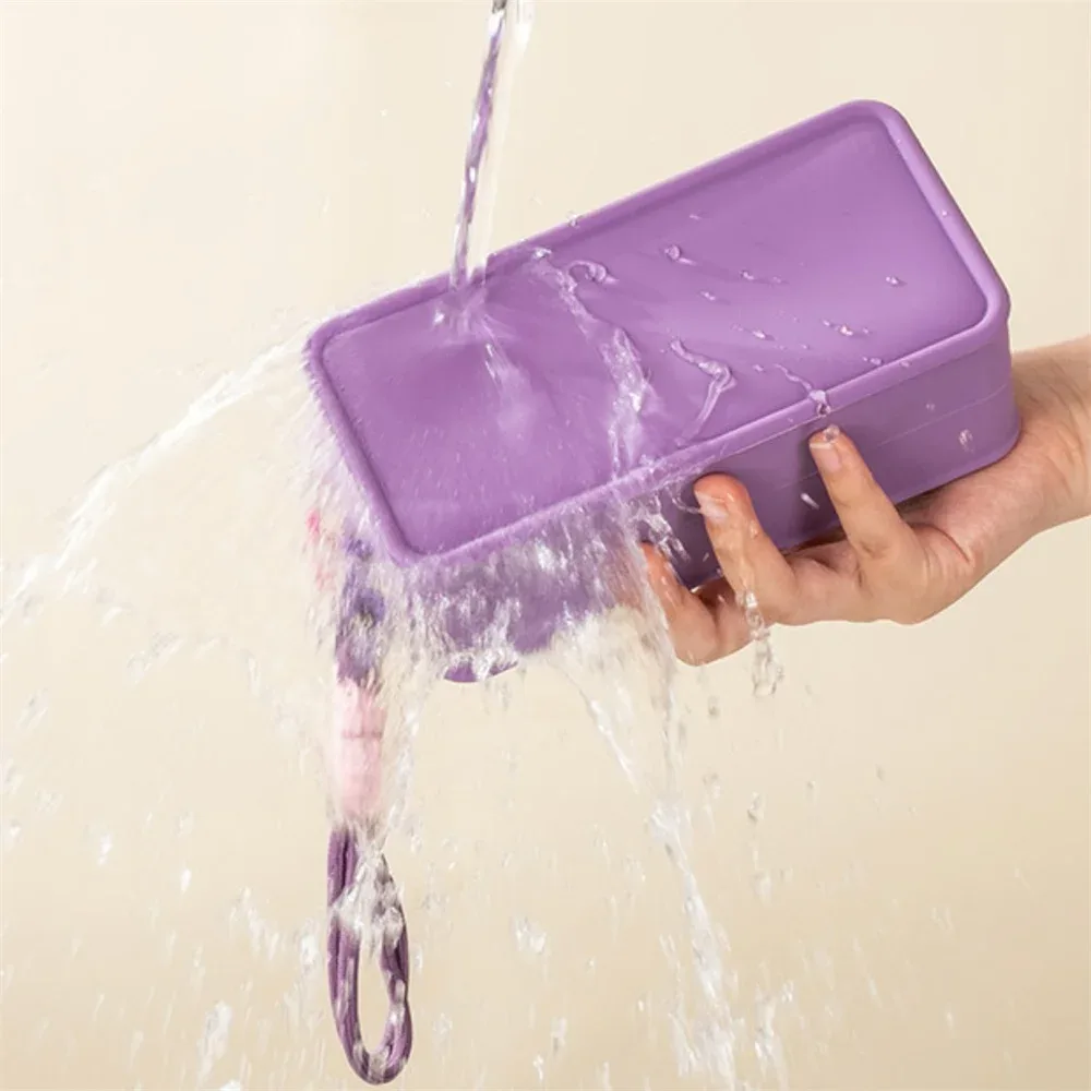 sac de maquillage en silicone couleur bonbon, avec corde de poignet tressée, sacs à cosmétiques portables avec lanière, sac de toilette étanche à fermeture éclair pour rouge à lèvres