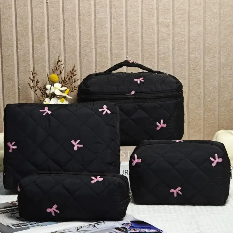 organisateur voyage polyester noir motif géométrique nœuds roses grande capacité matelassé usage journalier cosmétiques maquillage transport facile