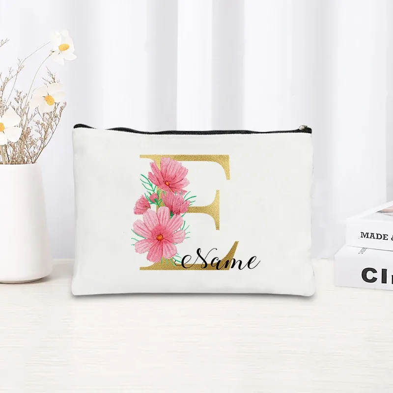 grande pochette zippée à motif floral rose et initiales dorées, organisateur d'essentiels de voyage en toile, trousse de maquillage pour enterrement de vie de jeune fille avec sac personnalisé avec nom.
