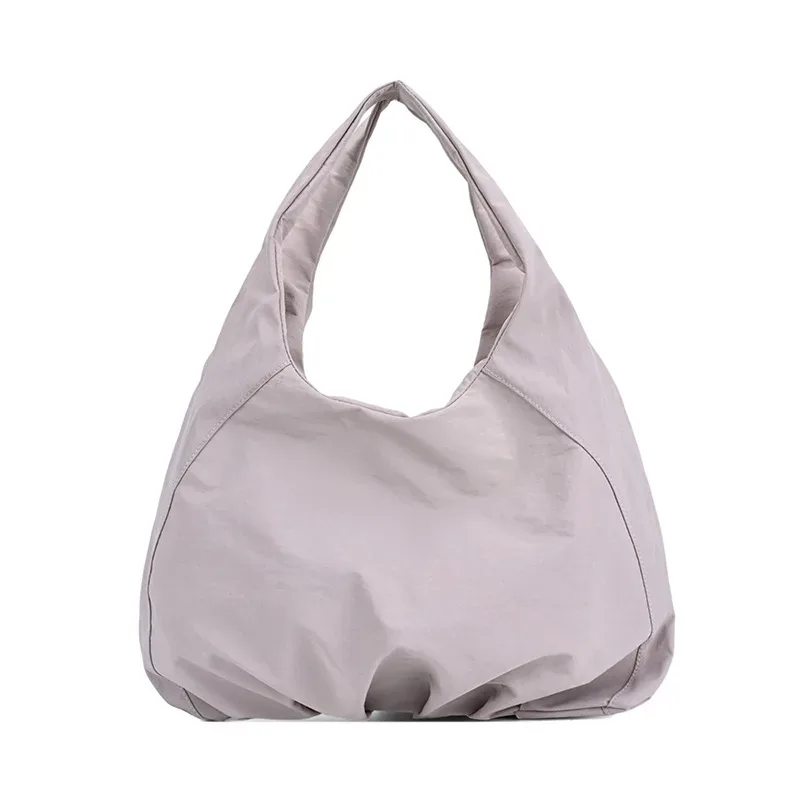 sac à bandoulière décontracté en nylon avec fermeture éclair et logo personnalisé, sac à main polyvalent pour les trajets quotidiens, pochette de rangement en polyester de couleur unie pour le shopping