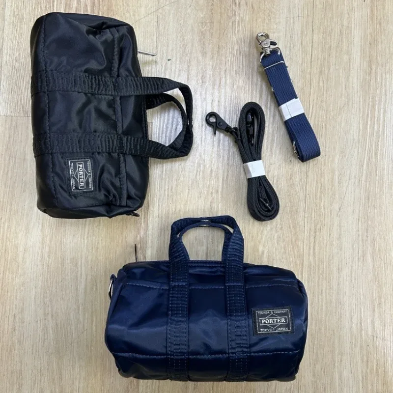 sac à main porter howl mini 2way pour hommes et femmes, petit sac bandoulière léger, style streetwear, mode quotidienne, portable pour les trajets quotidiens et les voyages.