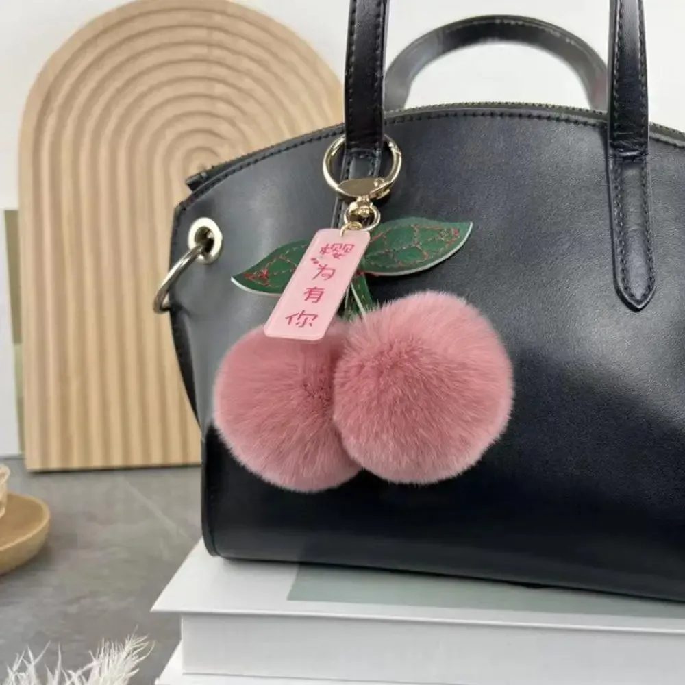 nouveau pelucheux lapin fourrure cerise porte-clés boule pompon porte-clés sac à main voiture porte-clés anneau cadeau femmes sac charme sac à dos accessoire