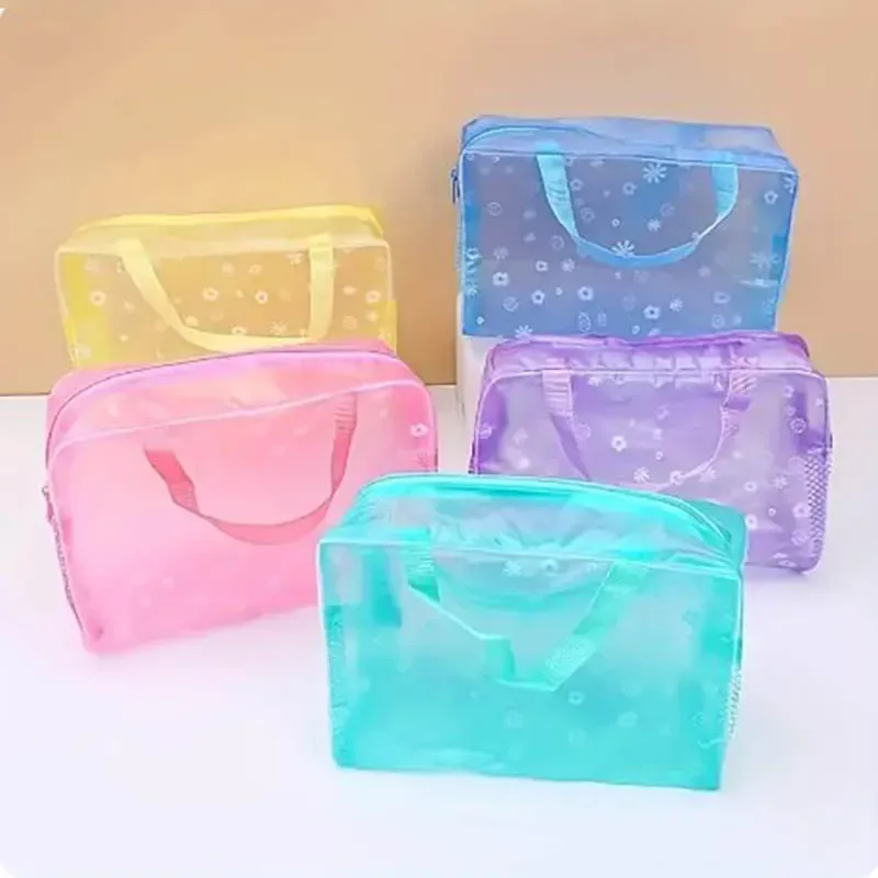 trousse toilette pvc transparent fleur blanche bleu poignée roue format petite valise voyage cosmétique maquillage