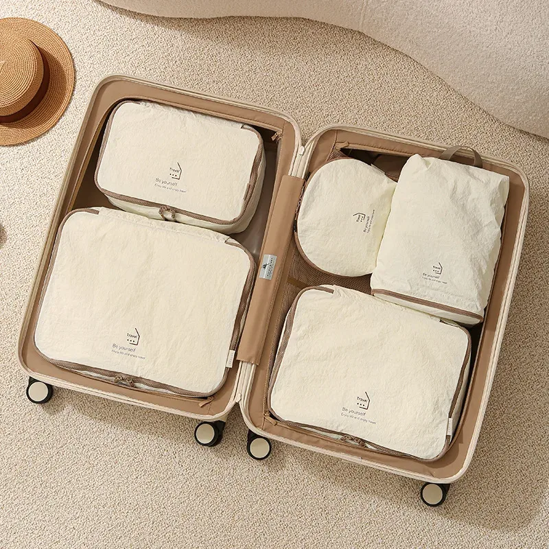 ensemble de cinq sacs de rangement de voyage compressibles en taslon, sac de rangement pour sous-vêtements, sac de rangement portable, pour organiser et trier les affaires en voyage.