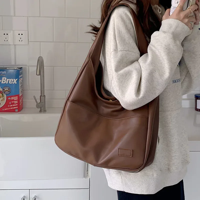 cgcbag 2024 nouveau simple grande capacité femmes sac à bandoulière décontracté déplacements luxe design sacs à main de haute qualité en cuir fourre-tout sac