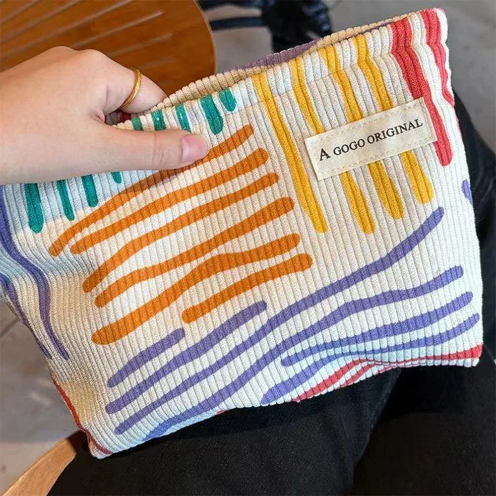 sac à cosmétiques en velours côtelé à rayures colorées, trousse de toilette de voyage portable, soins de la peau, articles divers, sac de rangement de maquillage esthétique pour un usage quotidien