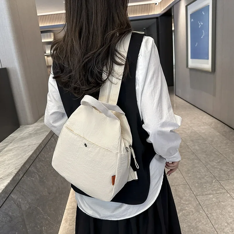 sac à dos léger et résistant à l'eau pour femmes, en tissu oxford durable, organisateur multi-poches pour les trajets quotidiens, les étudiants et les voyages