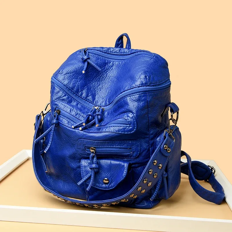 sac dos cuir matière similaire noir bleu gris marron poches multiples rivets dorés décontracté imperméable voyage école collège