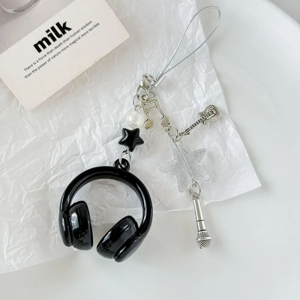 porte clé musical chaine métal accoutrements musicaux petit pendentif créatif voyage sac main pods casque bouton poussoir écouteurs accessoire voyage