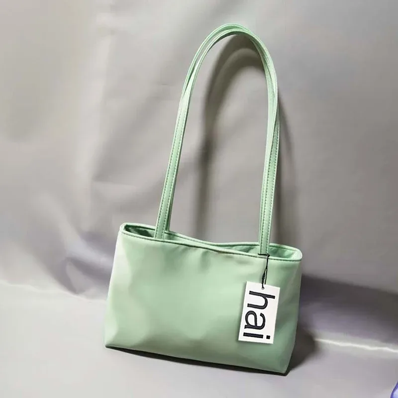 sacs à bandoulière de luxe en soie pour femmes, sac carré sous les bras, sac de banlieue de marque célèbre, fourre-tout macaron de couleur contrastée