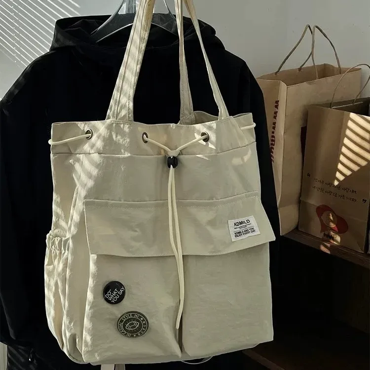 sac à dos léger et décontracté pour femme, idéal pour les voyages, les loisirs en plein air, en nylon, capacité 20-35l, avec compartiment pour ordinateur portable 14 pouces