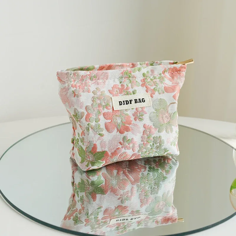 trousse polyester motif floral fleurs roses vertes fond blanc fermeture éclair voyage femmes cosmétiques maquillage sac rectangulaire